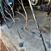 Vine Rail fabricated  with vines  or branches shown here  before powder coating.  Vines wrapped around post.