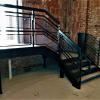 Custom Industrial Style Metal Staircase with accompanying Wall Rail