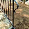 This railing is an example of using a basic rail style , but using a different volute than the standard.  This rail is using the  "fishtail" volute.