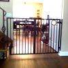 Small interior gate to provide a barrier for a large dog/pet.