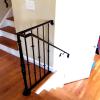 Custom Made -  A custom wall rail that goes up the steps and flows into a free standing handrail  that is positioned on a landing,. This provides safety going up and down the steps   and also on the landing..  .